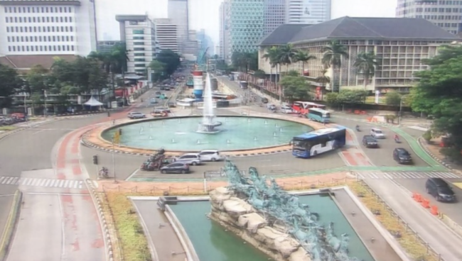 Traffic light Bundaran Patung Kuda, Jakarta Pusat, lancar.